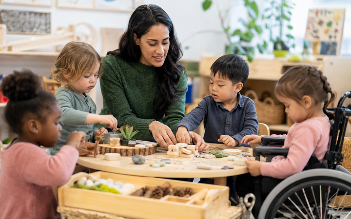 Child Development Practitioner working safely in a representative workplace