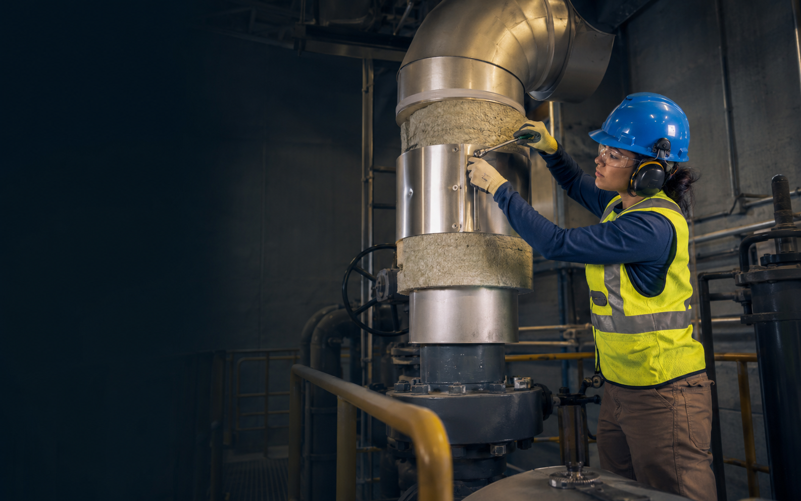 Heat and Frost Insulator working safely in a representative workplace