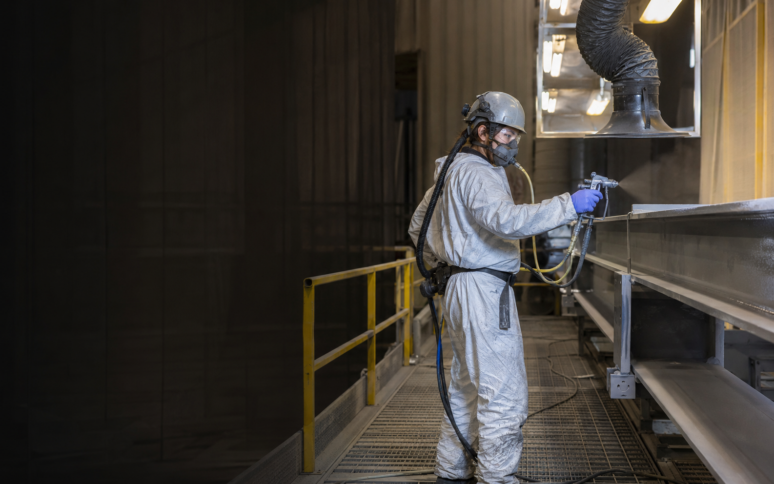 Painter and Decorator — Industrial working safely in a representative workplace