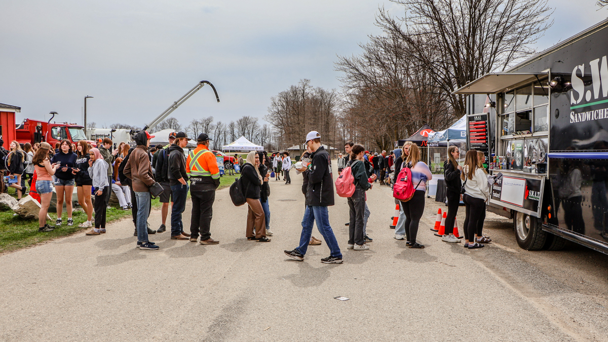 Students and exhibitors along the Showcase route